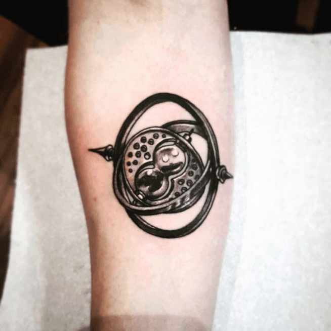 Black Ink Time Turner Tattoo Design For Forearm By Sean
