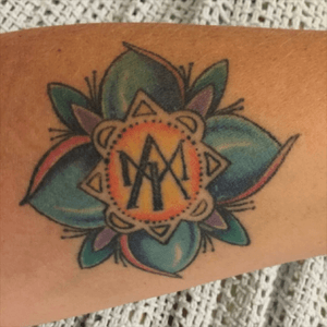 My 3rd tattoo and this one has all of my kids' initials (A, M, I)