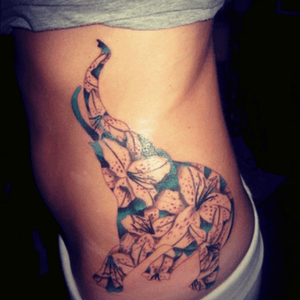 Love this placement #elephant #flowers #hip #ribs 