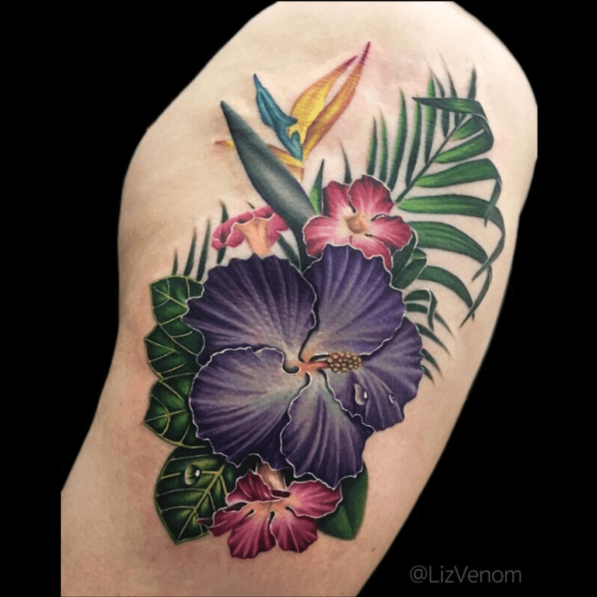 tropical flower leg tattoos