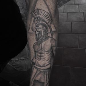 Spartan tattoo, looking for similar design but central to the upper back,  no bigger than A4. Preferably a forward facing Spartan design if anyone can  help and make it look in place