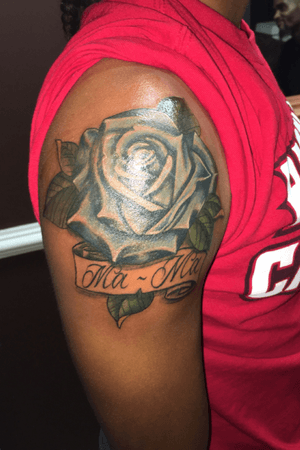 Blue Rose to represent my aunt passing away from ovarian cancer . Done by Tro from Black Ink Atlanta 