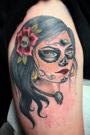 Day of the dead lady face on upper arm