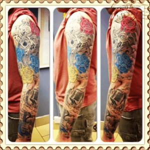 Music and roses sleeve #sleevetattoo #music #roses #guitar #microphone 