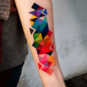 I would love to see this done in a sleeve or half sleeve. Very cool. #geometrictattoo #triangles #color #forearm 