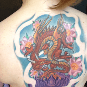 Dragon alone done some 23 yrs ago in FL. Background & recoloring done a few yrs ago by Gabe Cece at Studio Evolve in V. Beach. 
