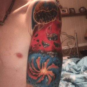 This one isnt finished yet. Going to add more to it. Making it a whole sleeve. But its a great start in ny opinion! I went in told my guy i wanted a galaxy themed sleeve with lots of color and just let him do the rest! 