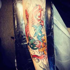 Not finished yet as i still need to get another two little koi's and then the dragon, but it shows my family the big one is me (cause this is my story haha) then the blue one is my niece the orange one is my sister and the green one is for my brother and that one has the number 19 in it because my brother was 19 when he passed away, so when i get the dragon im going to get the number 19 in it as if my brother has reached the top and turned in to a golden dragon just like the legend that once a Koi reaches the top it turns in to a golden dragon, and then the other two Koi's i still have to get are for my mum and dad 