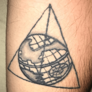 This is my first tattoo, it is the deadly allows from the movie Harry Potter with the Death Star from Star Wars. 