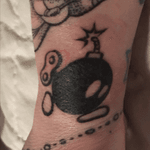 Tiny wind-up nintendo bomb by Casey Sass @ true blue tattoo in austin tx