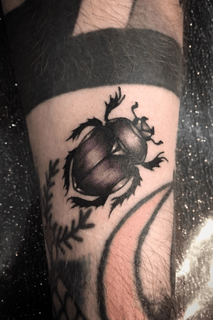 Scarab beetle on the forearm #scarabtattoo #bettle 