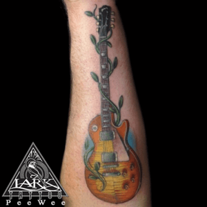 Tattoo by Lark Tattoo artist PeeWee. #tattoo #tattoos #tat #guitar #guitartattoo #colortattoo #sunburstguitar #music #musictattoo #tats #tatts #tatted #tattedup #tattoist #tattooed #tattoooftheday #ined #inkedup #ink #tattoooftheday #amazingink #bodyart #tattooig #tattoososinstagram #instatats #westbury #larktattoowestbury #larktattoo #larktattoos