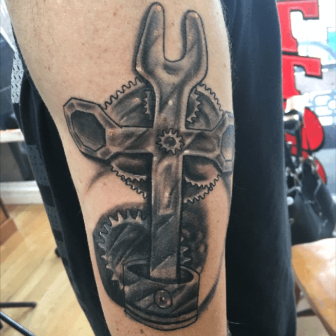 Tattoo of Swords Letters Weapons