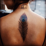 Balazsbercsenyi Amazing color! #feather #peacock #spinetattoo #color 