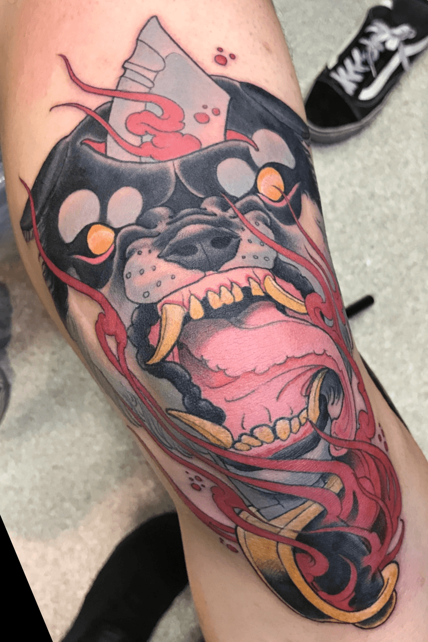 wolf skull on knee tattooTikTok Search