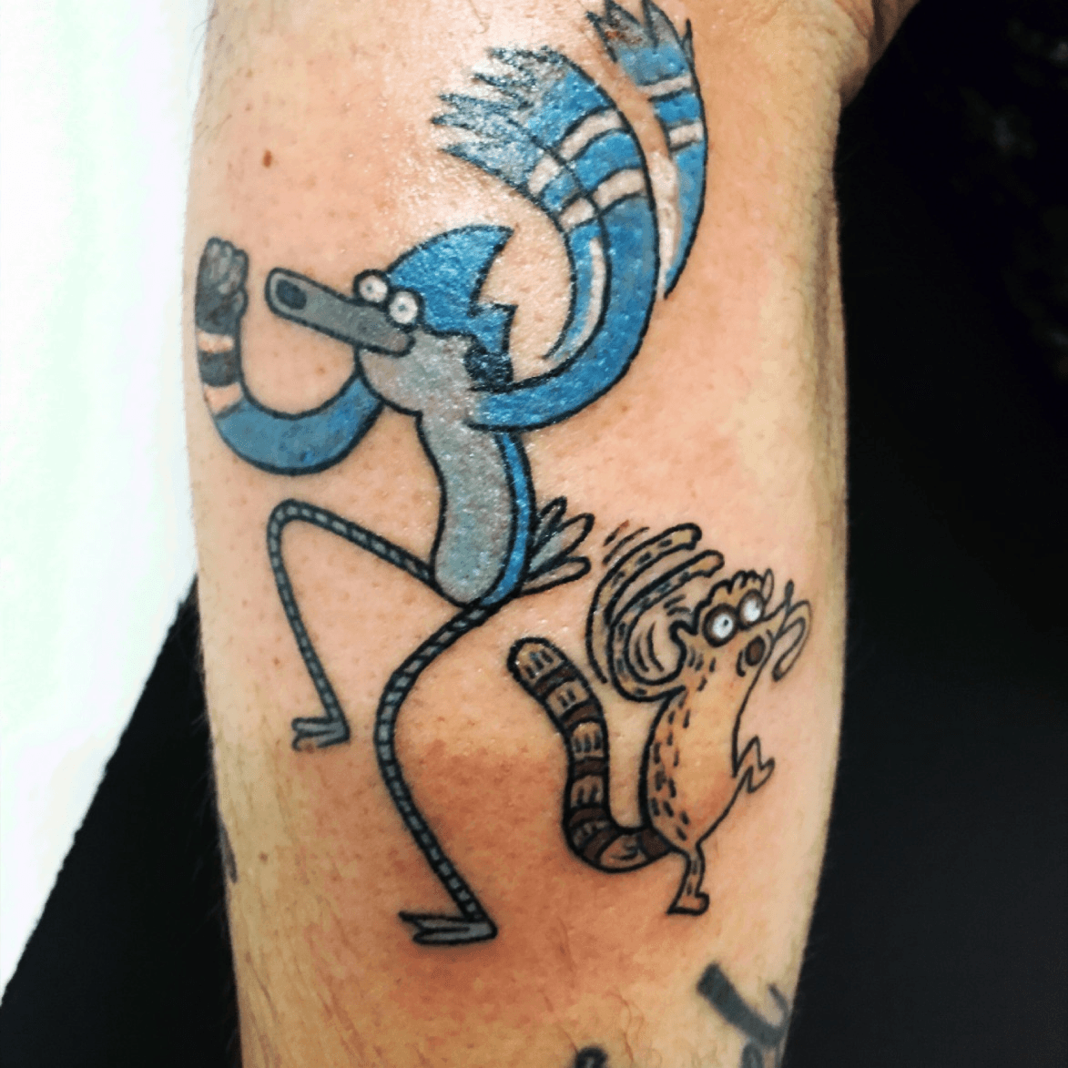 Rigby and Mordie gamin Really fun color tattoo Regular Show    Tattoos Color tattoo Cartoon tattoos