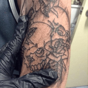 Skulls and roses tattoo 