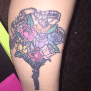 Flowers coming out of my leg with the bottom of bouquet turned into a zipper. The names of my 4 older children are in ribbons above bouquet. Havent been able to afford to add my other 2 kids yet. 