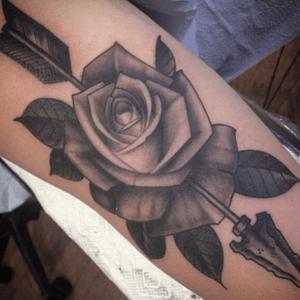 #roseandarrow tattoo i got in nyc last year -- love this one. Two things that pierce the human heart -- beauty and pain #rose #rosetattoo #arrow #arrowtattoo #blackandgrey 