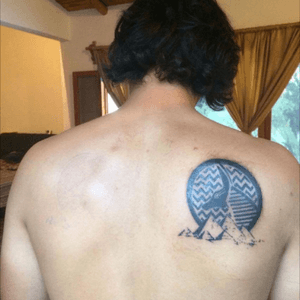This tattoo (my only one) conmemorates my 7 years in Egypt. I decided to get Anubis on my back along with the long standing Giza Pyramids. The lines across Anubis represent the water from the Nile. Without it, life would have never been able to flourish, and such a great civilization wouldnt have existed. 