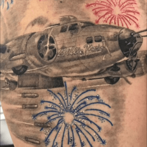 B17 bomber my father flew in ww2 with my mothers name on it (billie marie and my fathers (giff) in small letters under the window and ny sister (nan) in one if the dropped bomb                Its a memorial piece for my father and sister ( the fireworks are for her).       At 62 years old its my first tattoo took 10 hours straight.                      Done by ronnie flores at simms ink in napa ca. 