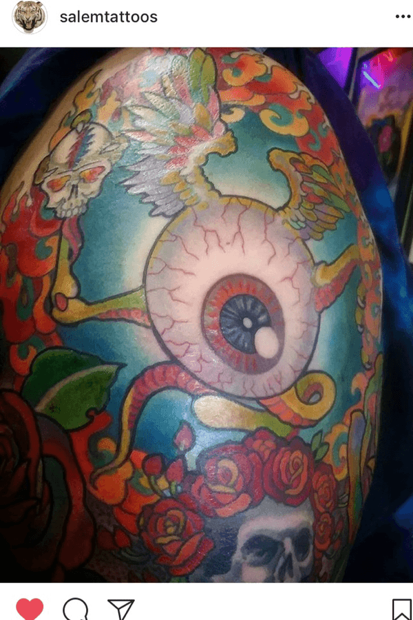 Tattoo from Eye of the Tiger Tattoo