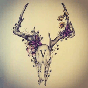 Deer skull with feminiw touches and Roman numeral 5 because I'm a 5th generation hunter.
