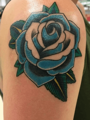 Blue traditional rose tattoo