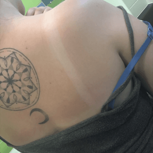 Suns out, tattoos out! #mandalatattoo #moon #dotwork #backpiece 