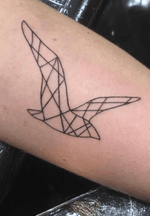 Geometric bird by tattoo artist Silvia Akuma