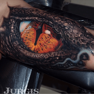 Awesome eye tattoo by Jurgis Mikalauskas. #blackandgreytattoos #blackandgraytattoo #eyetattoo #eyetattoo #reptiletattoo #reptile #blacktattoo #awesome 