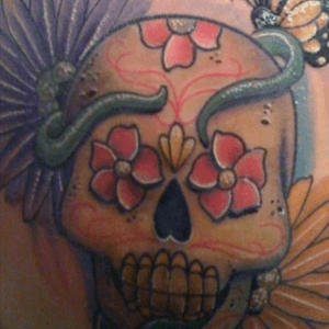 I am in love with skulls! Pretty close to all my tattoos have a skull in them somewhere! This one is on my right shoulder.