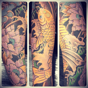 Gold koi and purple peonies added to existing japanese style sleeve.
