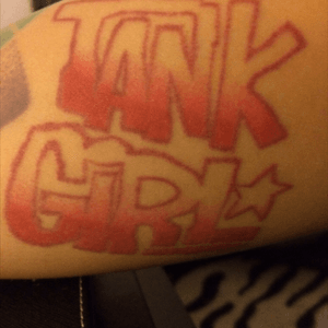 Dot work 'Tank Girl' logo in underpart of my upper arm (just above armpit)