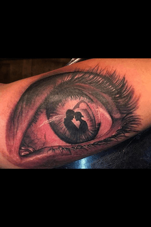 Got this eye with a sillouhette of my parents done by Jensen Ramirez out of Paizleys Wicked Iron tattoo in Tucson, Az