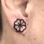 #earlobe #tattoo of #black #outline of a #clover by #artist #Kimsany @Kimsany #ear 