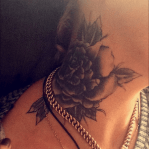 Rose tattoo on 1 side of my neck
