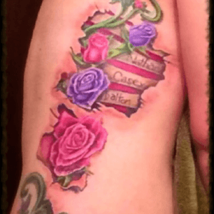 This piece actually runs from my right bicep (where it starts with a dreamcatcher) down to mid right thigh (where it ends with a turquoise heart pendant and feather)My boys are on my ribs, my daughter on the larger pink rose below my boys, and the himmingbird is for my grandmother. The design is mine and was inked at Flesh Hound Studio in Cape Girardeau Mo. by artist Andy Estes. Total of 37 hours.