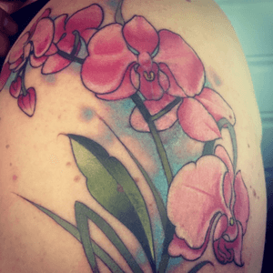 My beaitiful orchid flowers done by Lucas Wyld at Cairns City tattoo 