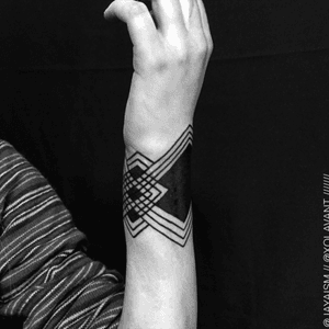 This is really cool! #geometric #angles #triangles #wrist #armband #blackAndWhite #blackwork 