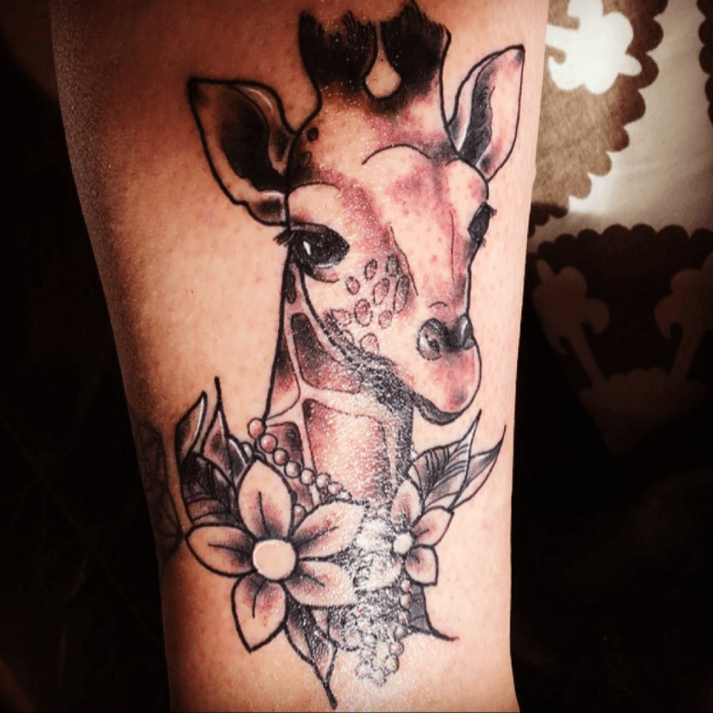 TattooCharm  A giraffe face and flowers in the shape of  Facebook