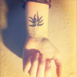 My very first ink #oneofmany #firstink #lotus #flower #wrist #oldie 