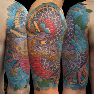Dragon tattoo with peonies #Dragon #Japanese #JapanesTattoo #Peony #tattoooftheday 