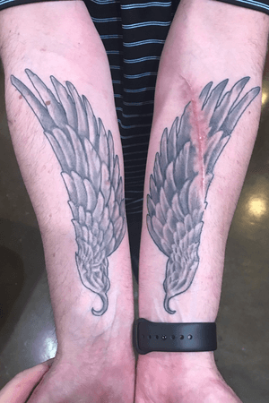 Pair of wings . The guy said keep the scar visible cause we all have broken wings