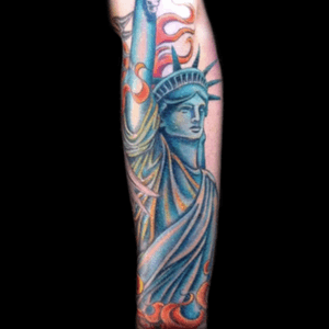 Tattoo by Lark Tattoo artist/owner Bruce Kaplan. #color #colorful #statue #statueofliberty #colorful #fire #flame #halfsleeve #arm #brucekaplan #owner #artist #ownerartist #artistowner #LarkTattoo #LarkTattooWestbury #NY #BestOfLongIsland #VotedBestOfLongIsland #BestOfNYC #VotedBestOfNYC #VotedNumber1 #LongIsland #NYC #TattoosEvenMomWouldLove
