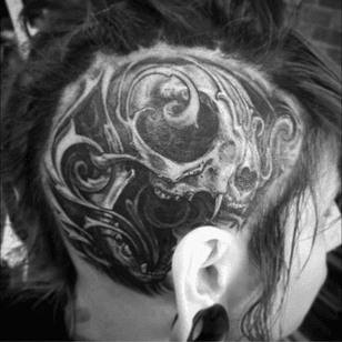 Cat skull by Jason Angst. #catskull #jasonangst #filigree #headtattoo #skull #blackandgrey 