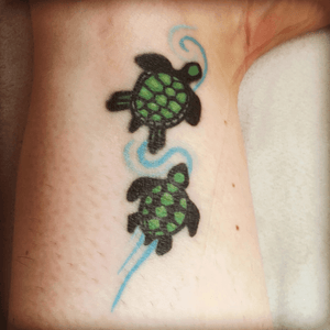 Sea turtles that represent me and my son. 