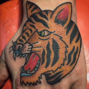 Big cat hand job. 2015. #bonumvitae #tiger #tigertattoo #athensga 