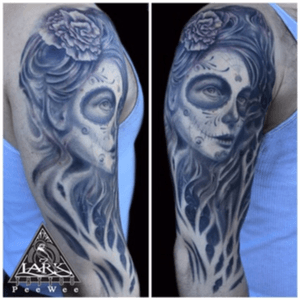 Black and gray tattoo of  day of the dead style female portrait  by Lark Tattoo artist PeeWee #blackandgrey #blackandgreytattoos #blackandgray #blackandgreyrealism #dayofthedead #sugarskulltattoo #sugar 