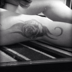 Blue and pink rose on side of knee just preferred picture in grey 